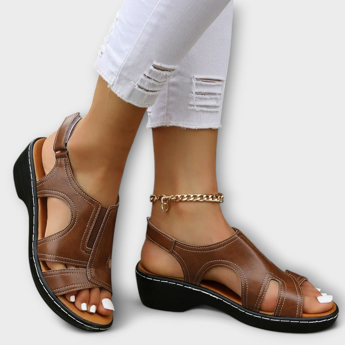 Carolyn Cut-Out Wedge Sandals in Brown
