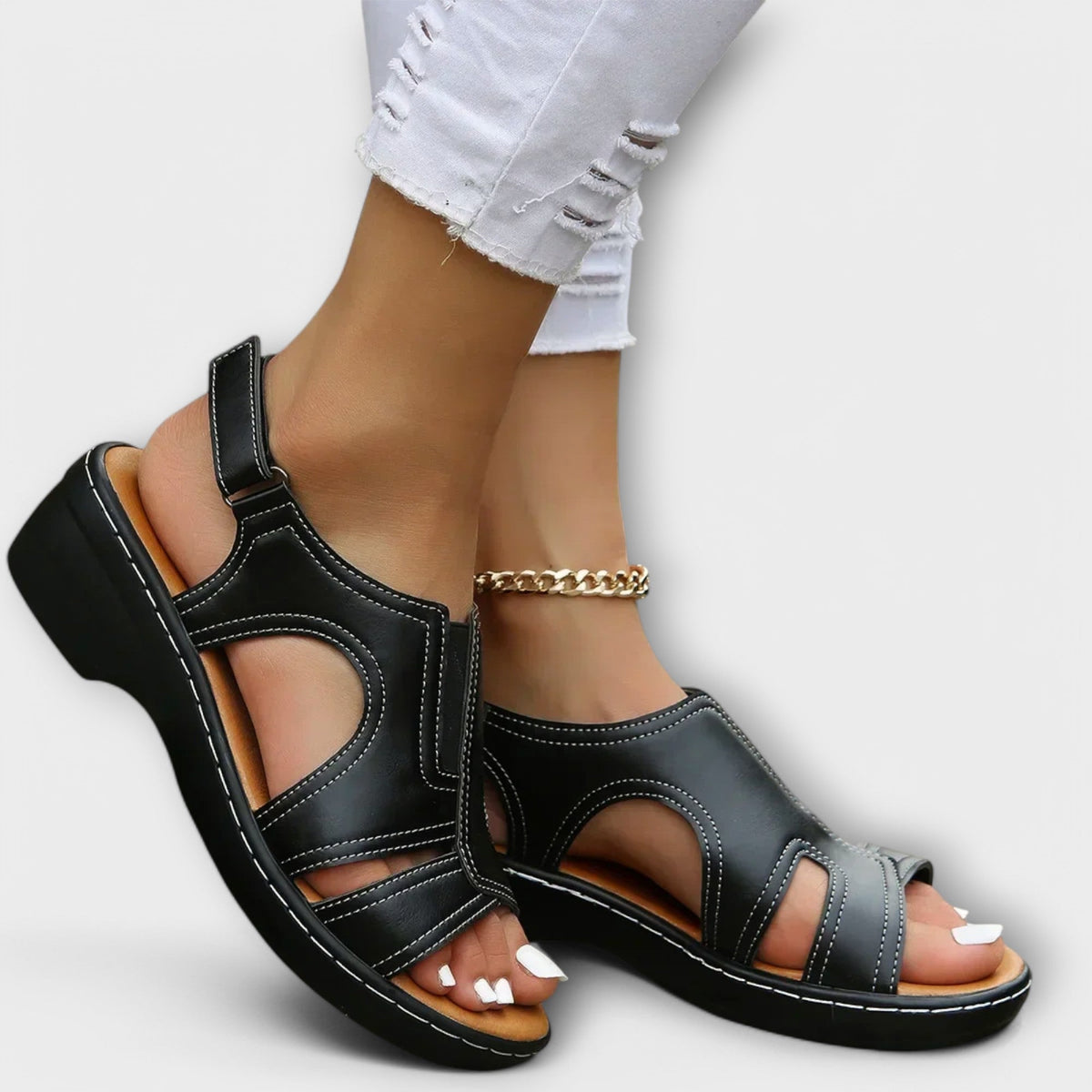 Carolyn Cut-Out Wedge Sandals in Black
