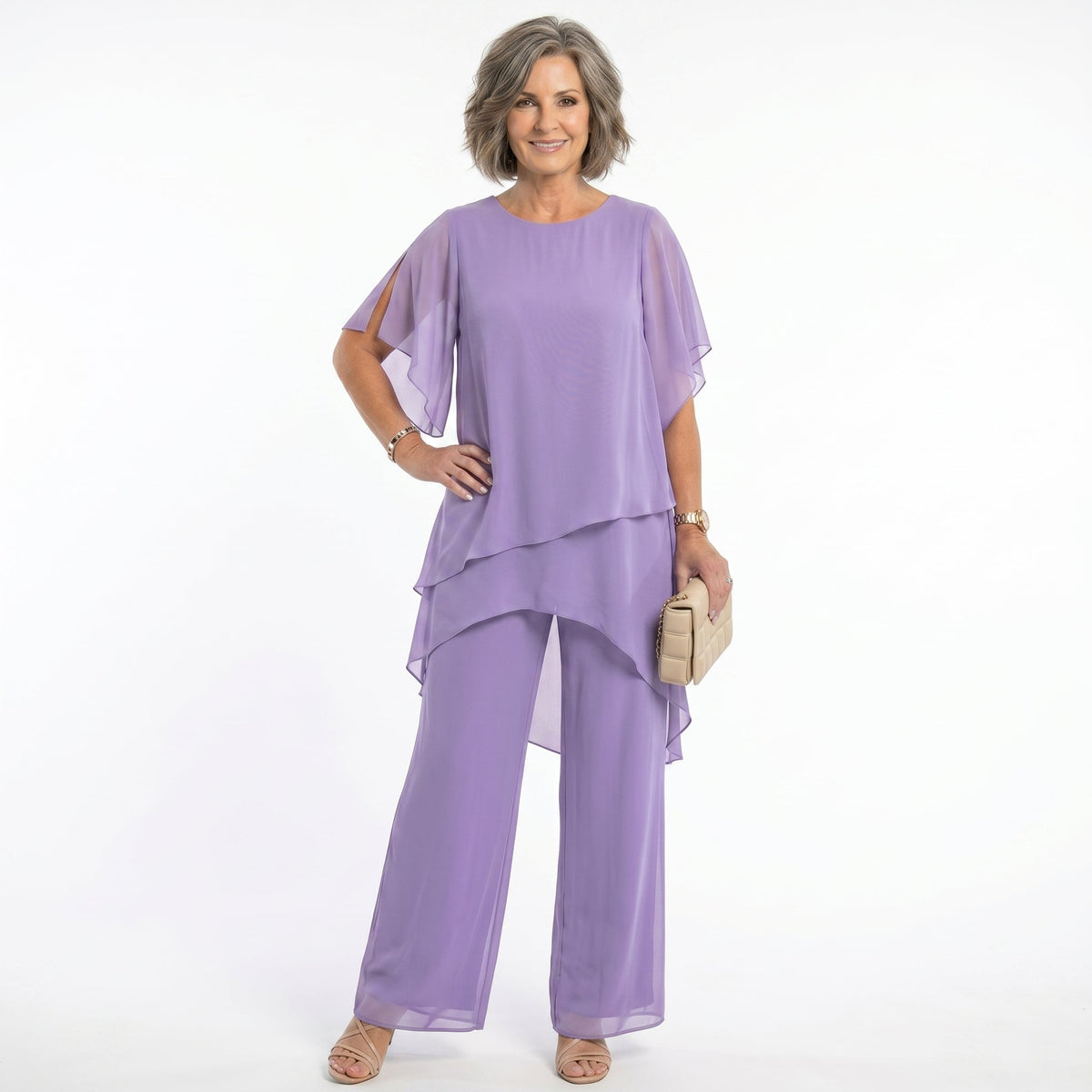 Detail of the short, floaty sleeves on a navy blouse, designed for unrestricted movement and gentle coverage.